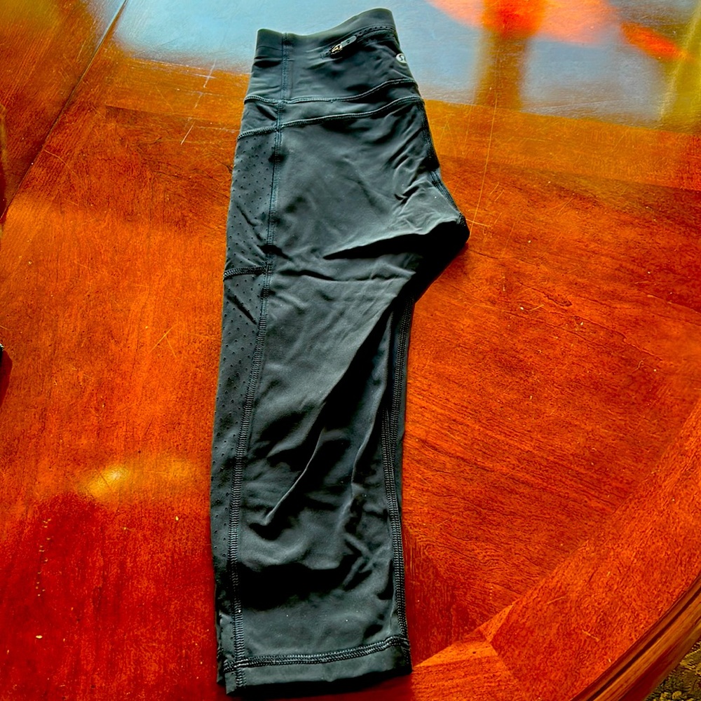 Lululemon size extra small, black leggings, knee length